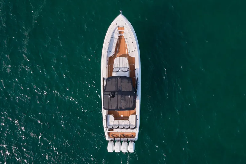 Slide: The Image of Aerial view of 2020 Midnight Express 37' Open boat on clear water. - 7