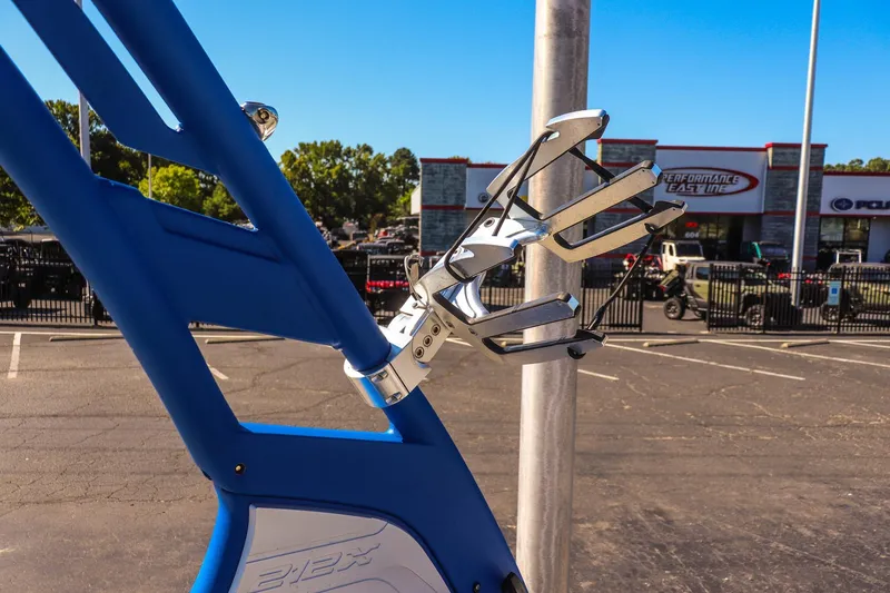 Slide: The Image of 2019 Yamaha Boats 212X wakeboard rack in a parking lot setting. - 18