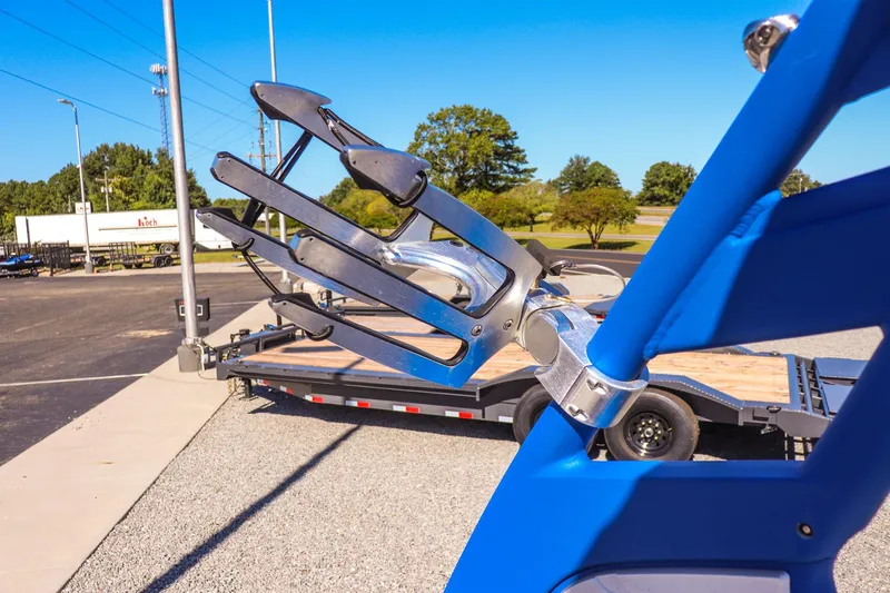 Slide: The Image of 2019 Yamaha Boats 212X wakeboard rack on a sunny day. - 19