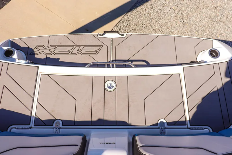 Slide: The Image of 2019 Yamaha Boats 212X swim platform with sleek design and integrated cup holders. - 22
