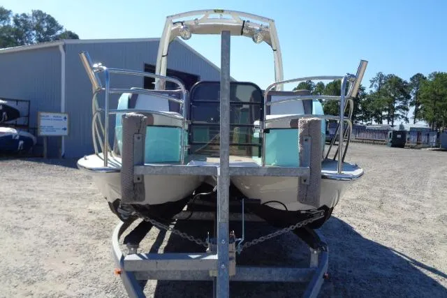 Slide: The Image of 2018 Caravelle Razor 238 PF boat on trailer, parked outdoors. - 10