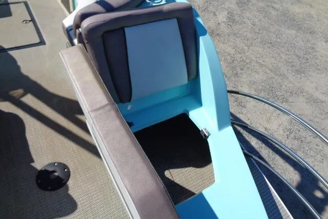 Slide: The Image of 2018 Caravelle Razor 238 PF boat seating area with blue and gray upholstery. - 13