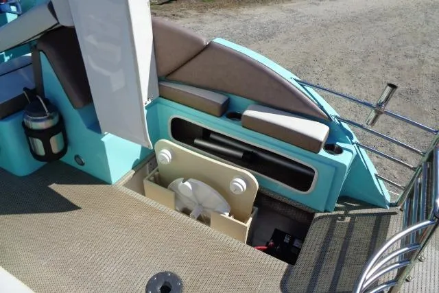 Slide: The Image of 2018 Caravelle Razor 238 PF boat interior with seating and storage compartments. - 23