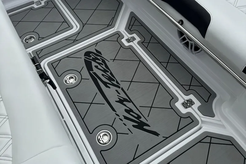 Slide: The Image of 2022 Nor-Tech 390 Sport Center Console deck with custom logo and sleek design. - 16