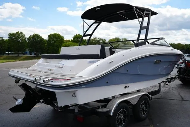 Slide: The Image of 2026 Sea Ray SPX 210 boat on trailer, featuring sleek design and modern canopy. - 5