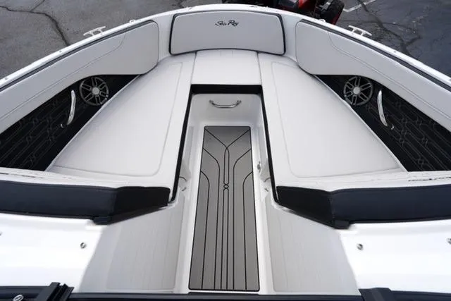 Slide: The Image of 2026 Sea Ray SPX 210 boat interior with sleek seating and modern design. - 9