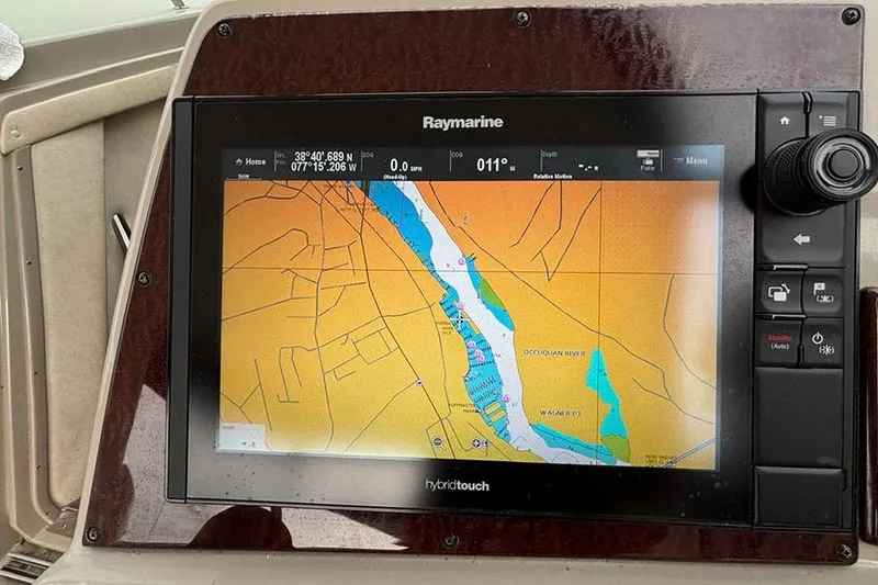 Slide: The Image of Raymarine navigation display on 2011 Sea Ray 370 Sundancer, showing a detailed marine map. - 18