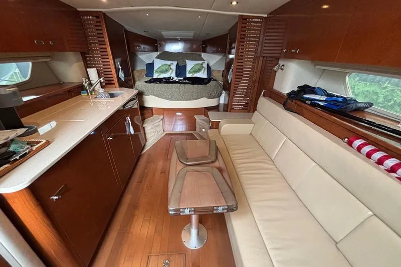 Slide: The Image of Luxurious interior of 2011 Sea Ray 370 Sundancer yacht with cozy seating and elegant design. - 22
