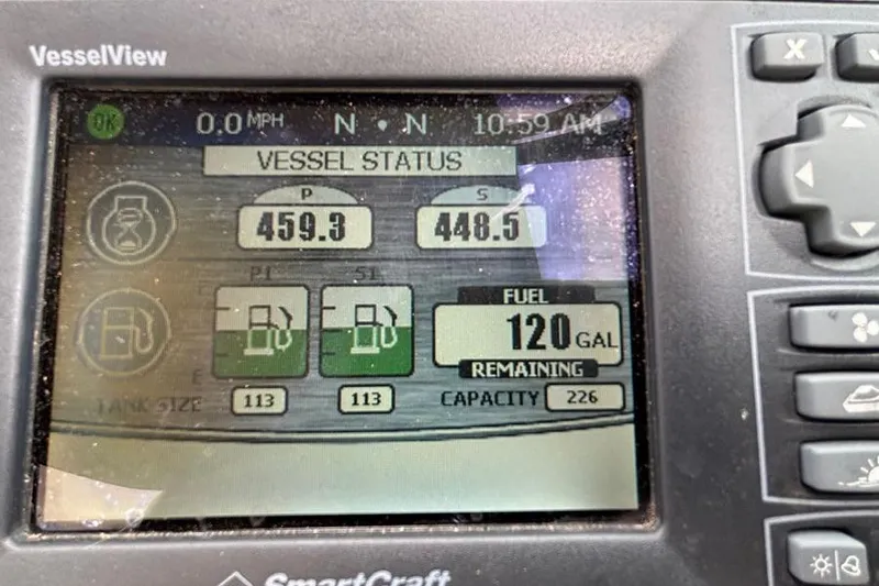 Slide: The Image of VesselView display on 2011 Sea Ray 370 Sundancer showing fuel status and engine data. - 8