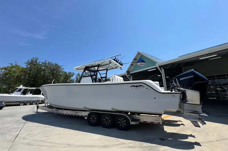 Slide: The Image of 2021 Invincible 35' Catamaran on trailer at Grander Marine dealership. - 17