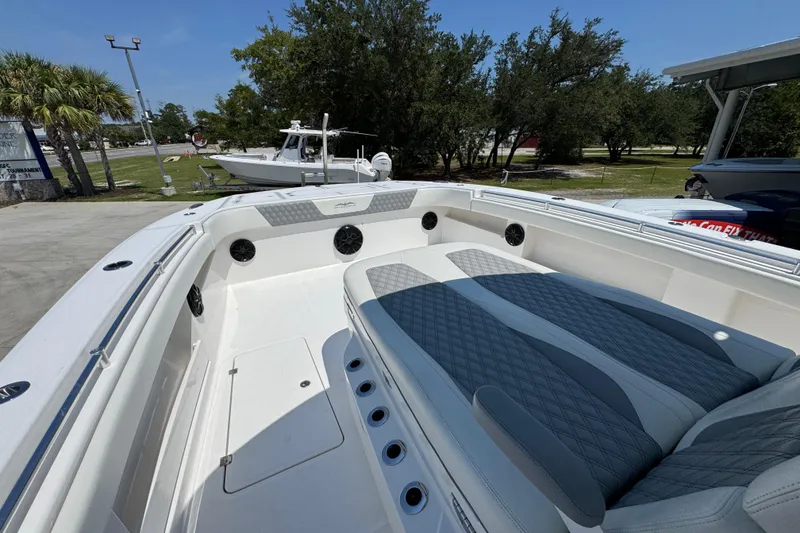 Slide: The Image of 2021 Invincible 35' Catamaran with Garmin xHD2 radar, docked under a cloudy sky. - 20