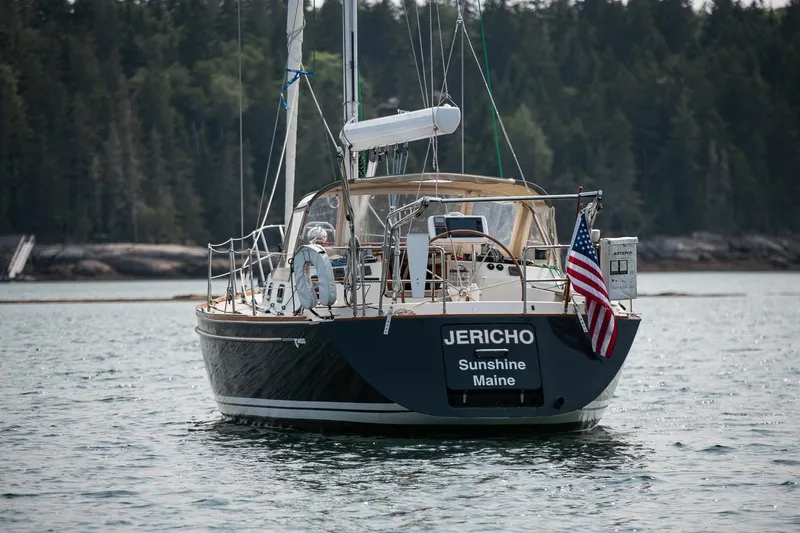 Slide: The Image of Sailboat Tartan 4100, 2002 model, named Jericho, anchored in scenic Maine waters. - 16