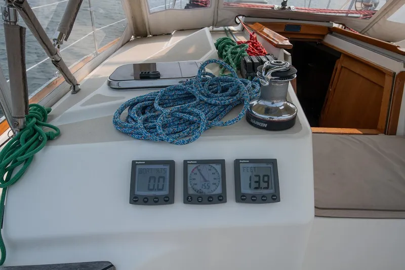 Slide: The Image of Cockpit of 2002 Tartan 4100 sailboat with ropes and navigation instruments. - 32