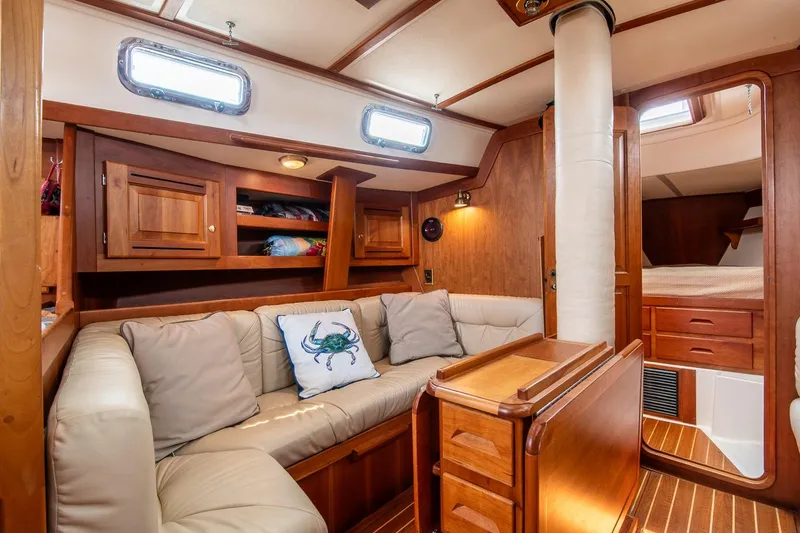 Slide: The Image of Luxurious 2002 Tartan 4100 yacht interior with cozy seating and elegant wood finish. - 47
