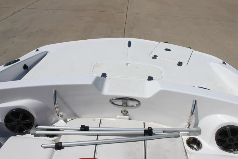 Slide: The Image of 2022 Tahoe 2150 boat deck with storage compartments and stainless steel fittings. - 22