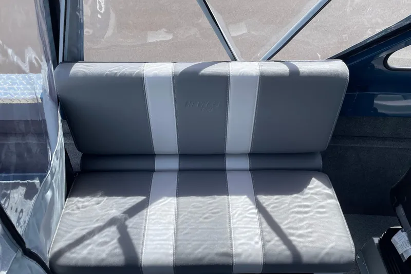 Slide: The Image of 2026 Hewescraft 200 ProV boat interior with gray and white seating. - 12