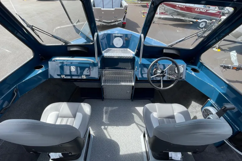 Slide: The Image of Interior of 2026 Hewescraft 200 ProV boat with dual seats and steering console. - 15