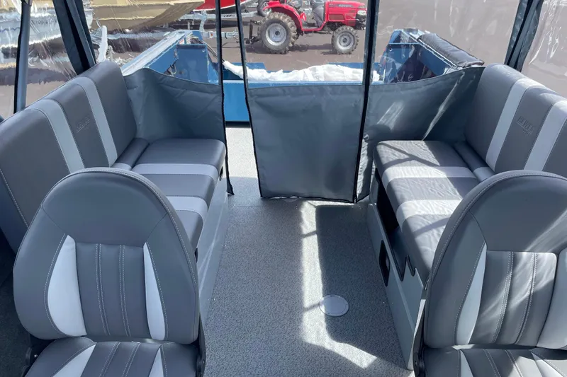 Slide: The Image of 2026 Hewescraft 200 ProV interior with gray seating and spacious layout. - 18