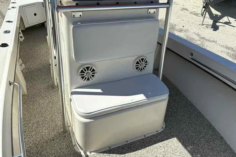 Slide: The Image of 2001 May-Craft 2300 CC boat interior with seating and built-in speakers. - 14