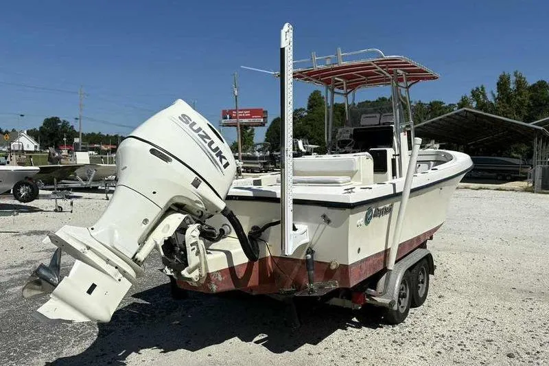 Slide: The Image of 2001 May-Craft 2300 CC boat with Suzuki outboard motor on trailer. - 6