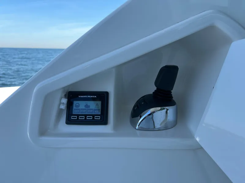 Slide: The Image of Control panel of 2021 Tiara Yachts C49 Coupe with Volvo Penta display. - 12