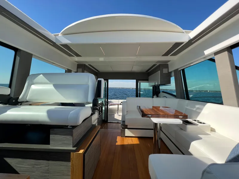 Slide: The Image of Luxurious interior of 2021 Tiara Yachts C49 Coupe with ocean view. - 27