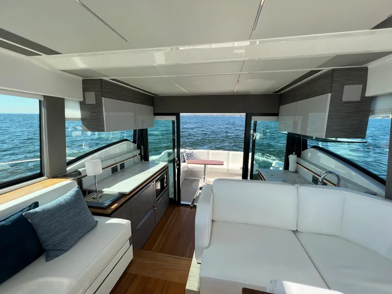 Slide: The Image of Luxurious interior of 2021 Tiara Yachts C49 Coupe with ocean view. - 28