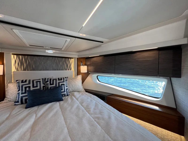 Slide: The Image of Luxurious bedroom interior of 2021 Tiara Yachts C49 Coupe with modern design and ocean view. - 34