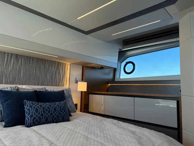 Slide: The Image of Luxurious bedroom interior of 2021 Tiara Yachts C49 Coupe with modern design and ocean view. - 40
