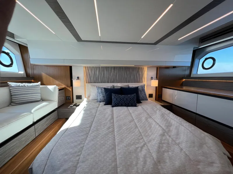 Slide: The Image of Luxurious bedroom interior of 2021 Tiara Yachts C49 Coupe with modern design and elegant furnishings. - 43