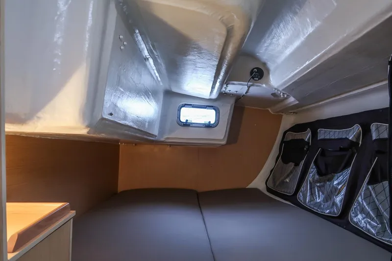 Slide: The Image of Interior cabin of 2017 Jeanneau SunFast 3200 sailboat, featuring compact sleeping area. - 37