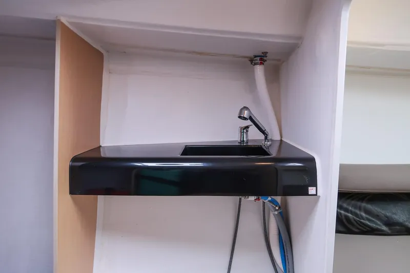 Slide: The Image of Black sink with faucet in 2017 Jeanneau SunFast 3200 yacht interior. - 42