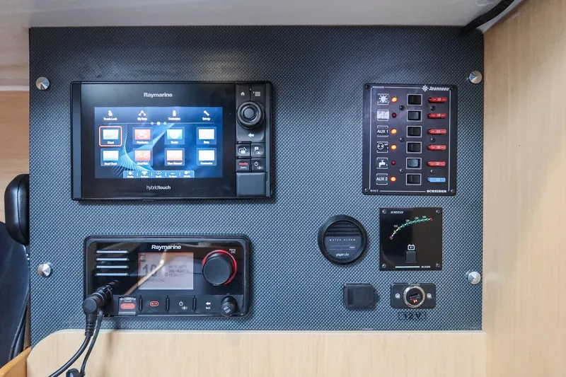Slide: The Image of Control panel of 2017 Jeanneau SunFast 3200 with Raymarine navigation equipment. - 43