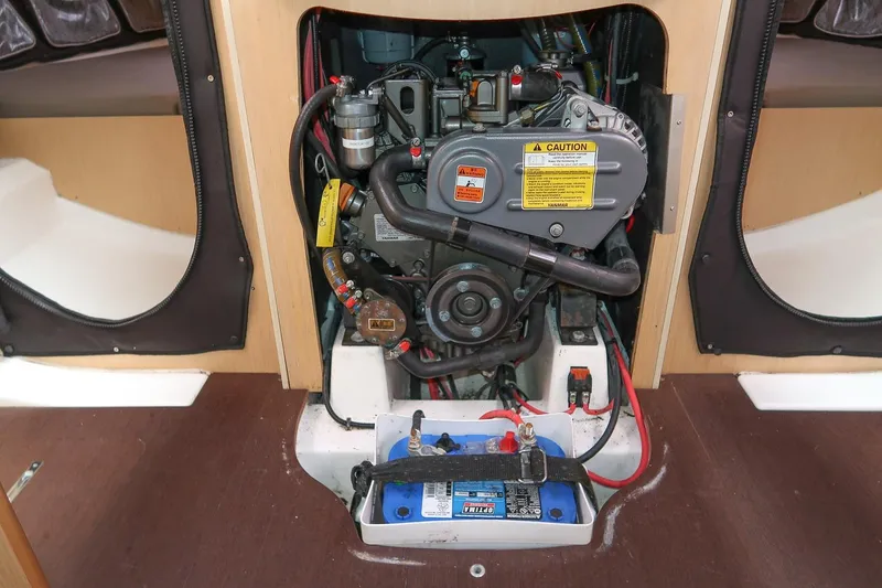 Slide: The Image of Engine compartment of 2017 Jeanneau SunFast 3200 sailboat, featuring Yanmar engine and battery. - 45