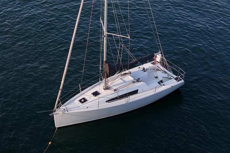 Slide: The Image of 2017 Jeanneau SunFast 3200 sailboat on calm water, aerial view. - 7