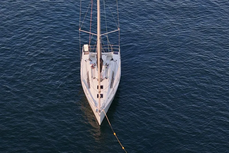 Slide: The Image of Aerial view of 2017 Jeanneau SunFast 3200 sailboat on calm water. - 8