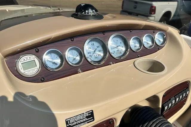 Slide: The Image of Dashboard of 2003 Chaparral Sunesta 222 boat with gauges and compass. - 12
