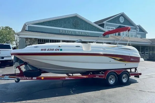 Slide: The Image of 2003 Chaparral Sunesta 222 boat on trailer at Reeds Marine dealership. - 2