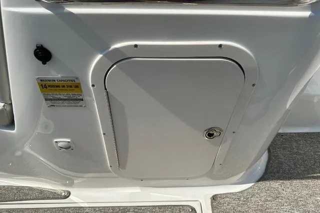 Slide: The Image of 2003 Chaparral Sunesta 222 boat storage compartment with capacity label. - 25