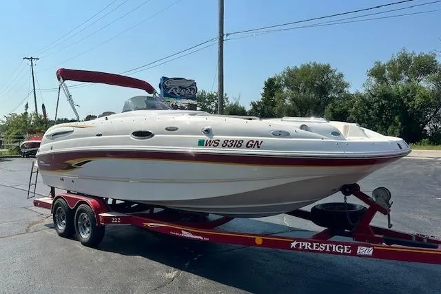 Slide: The Image of 2003 Chaparral Sunesta 222 boat on trailer, parked outdoors. - 5