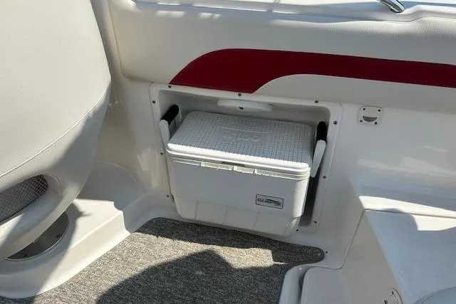 Slide: The Image of 2003 Chaparral Sunesta 222 boat interior with built-in cooler storage. - 8