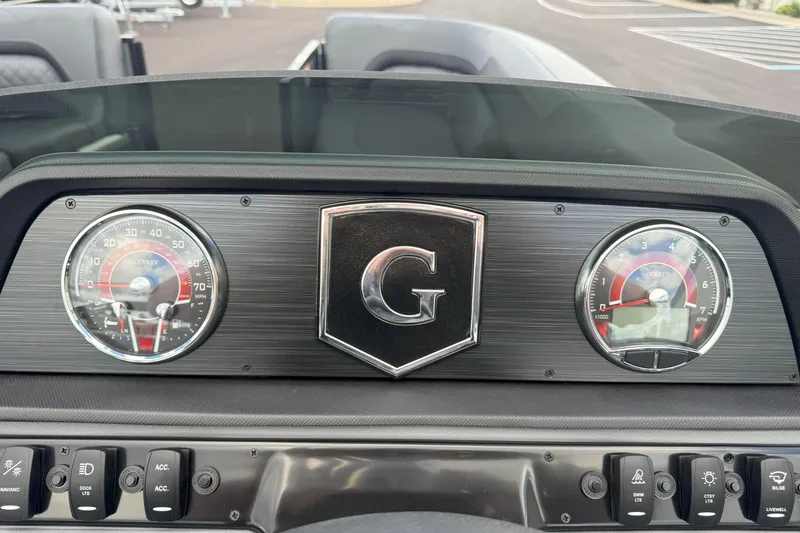 Slide: The Image of Dashboard of 2026 Godfrey SWEETWATER 2286 SFL with gauges and controls. - 13