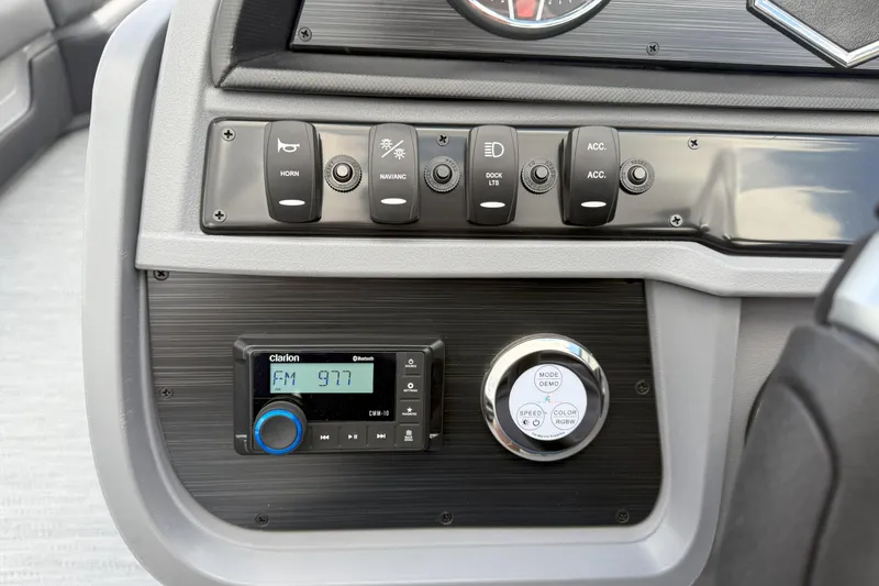 Slide: The Image of Control panel of 2026 Godfrey SWEETWATER 2286 SFL with radio and switches. - 14