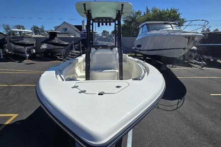 Slide: The Image of 2026 Key West 203 FS boat displayed in a marina, surrounded by other vessels. - 4