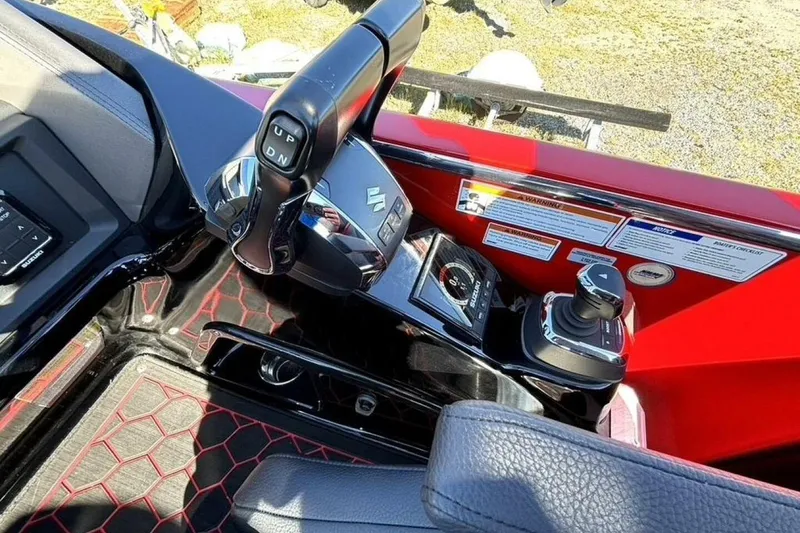 Slide: The Image of Control panel of 2022 Manitou XT 27 SRW with joystick and throttle lever. - 22