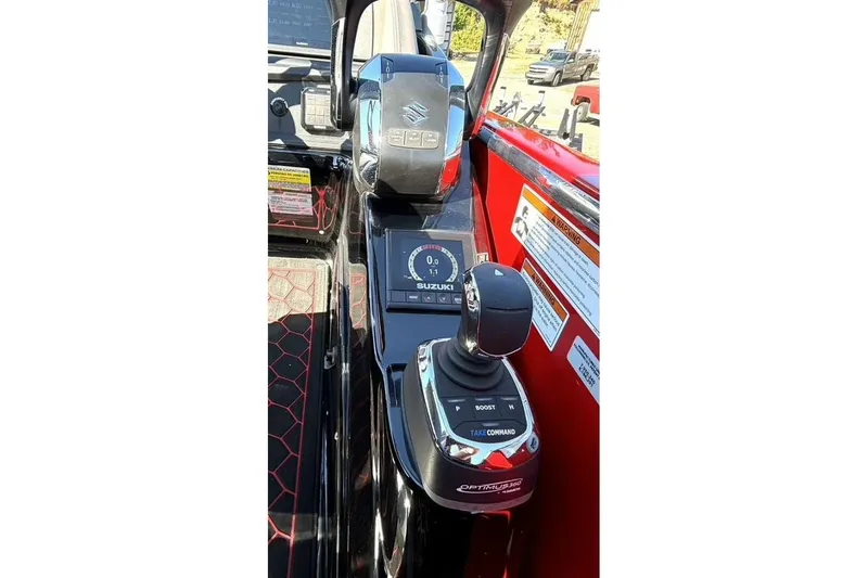 Slide: The Image of Control panel of 2022 Manitou XT 27 SRW with Suzuki engine controls and digital display. - 23