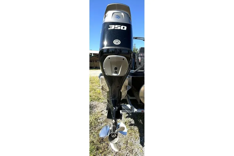 Slide: The Image of 2022 Manitou XT 27 SRW boat engine, 350 horsepower, displayed outdoors. - 40