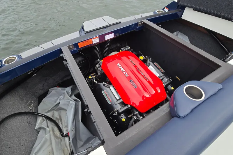 Slide: The Image of 2019 Axis T23 boat engine compartment with red Monsoon engine cover. - 28