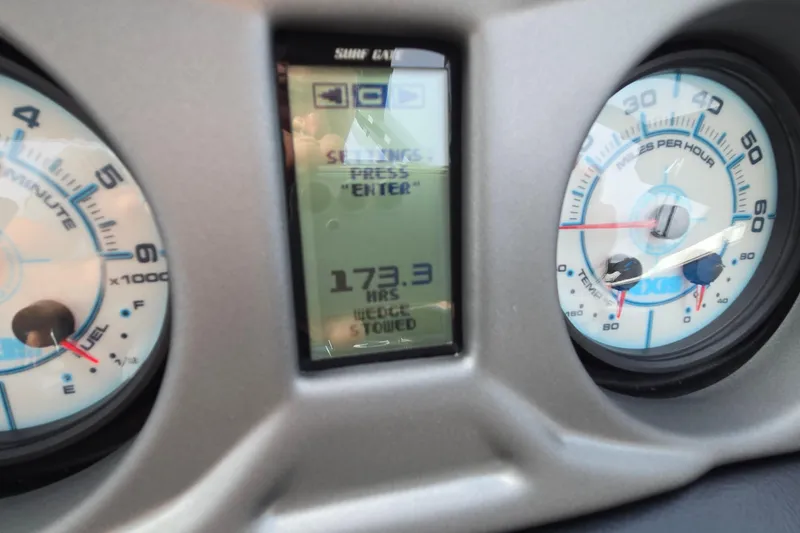 Slide: The Image of Dashboard of 2019 Axis T23 boat showing 173.3 hours on display. - 33