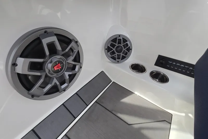 Slide: The Image of 2019 Axis T23 boat interior with speakers and control panel. - 37